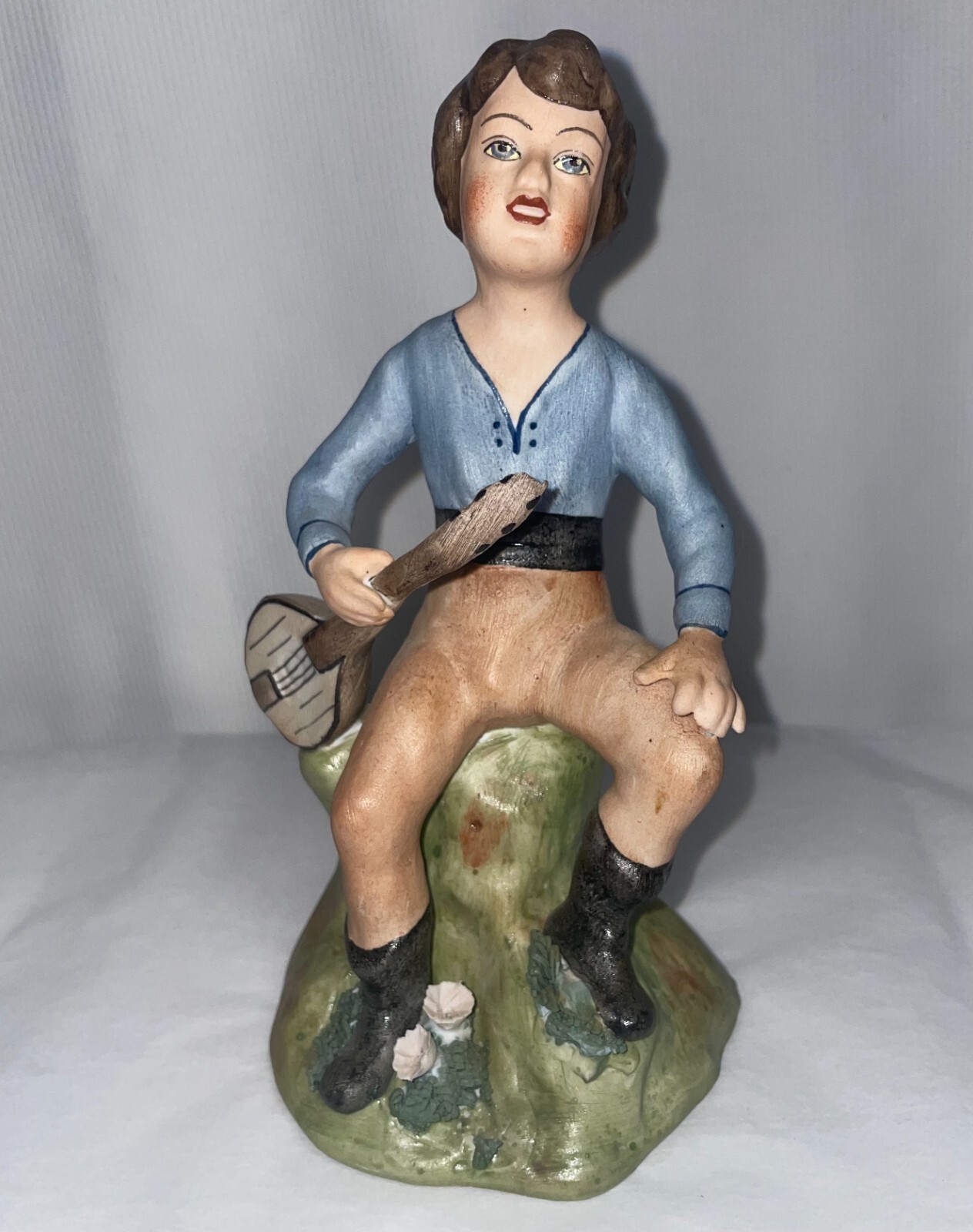 Bisque Porcelain Boy W/Stringed Instrument Figurine Romania 6 1/2 Inches High