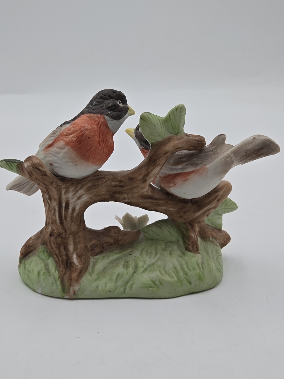 Vintage Lefton Robins on branch with flowers.