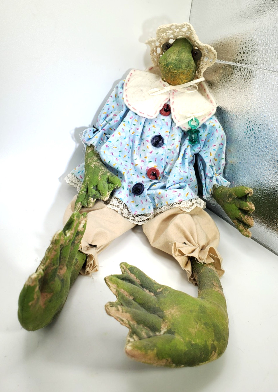 Hand Crafted Baby Frog Doll, with Pacifier, in Camo Pattern, wearing a Bonnet