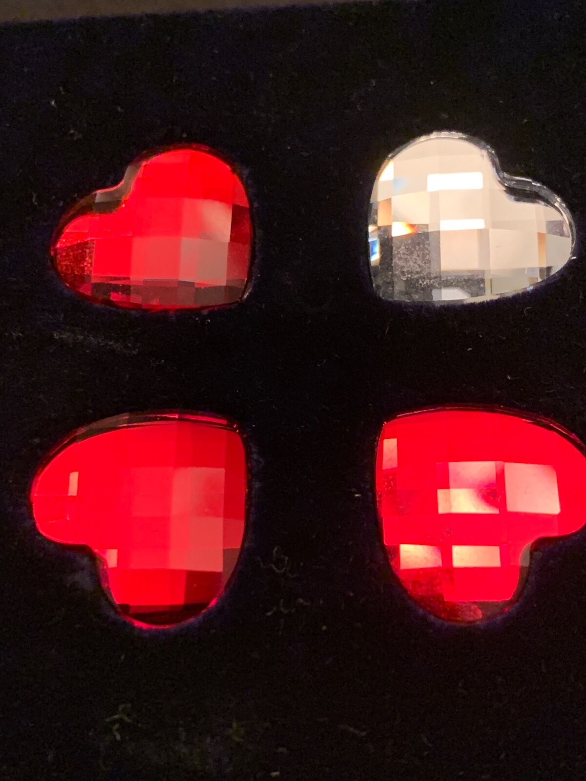 Swarovski four hearts 3 red one clear Crystal figurine