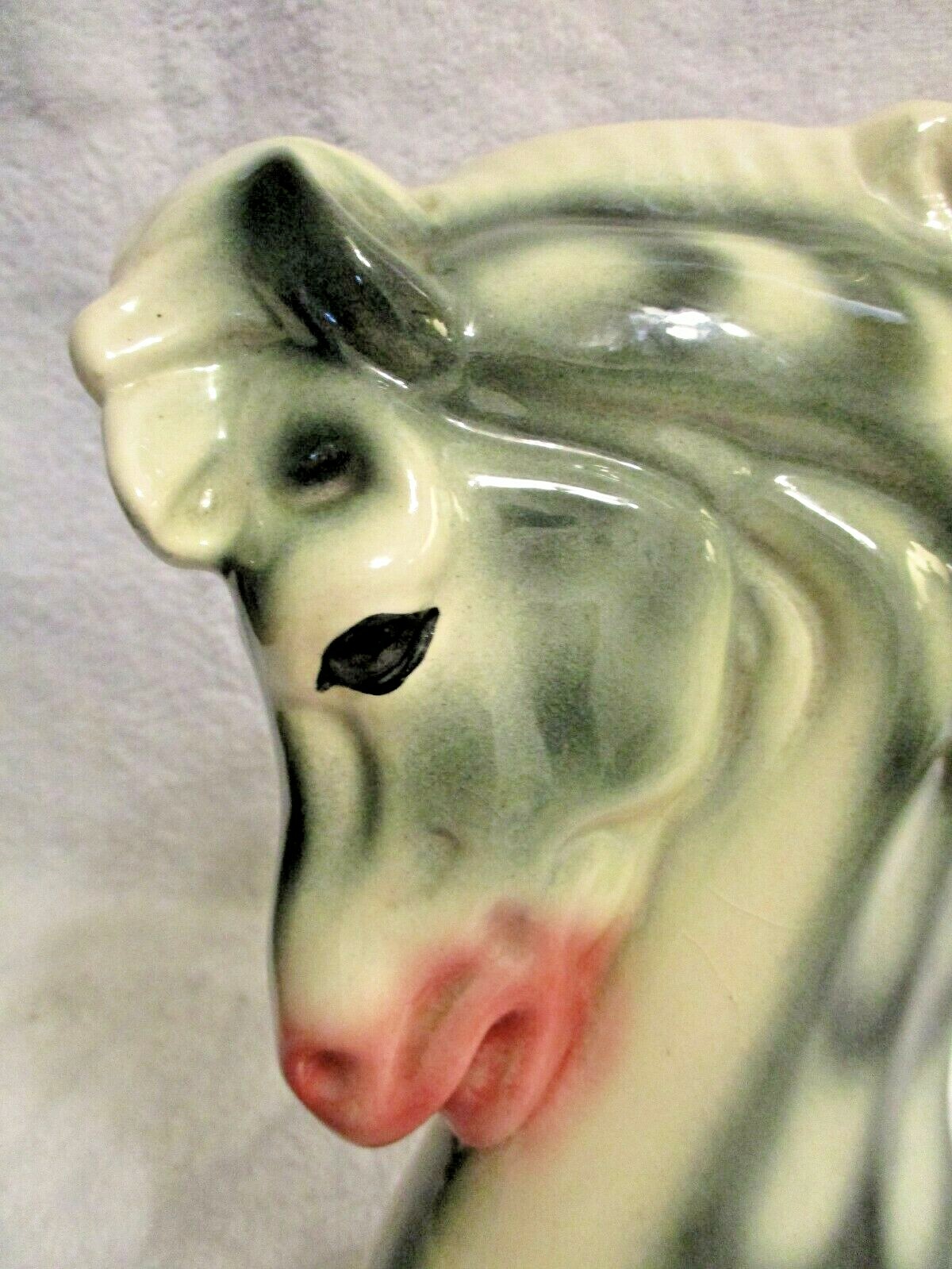 Matching Pair Porcelain Green and White Pink Snout Sea Horse Head Figurines