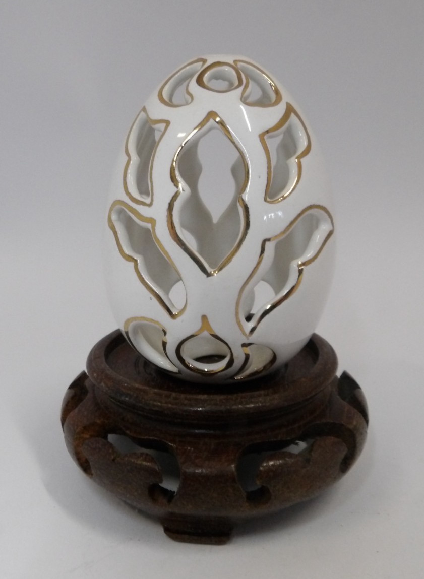 Vintage White and Gold Pierced Porcelain Egg with Wood Base