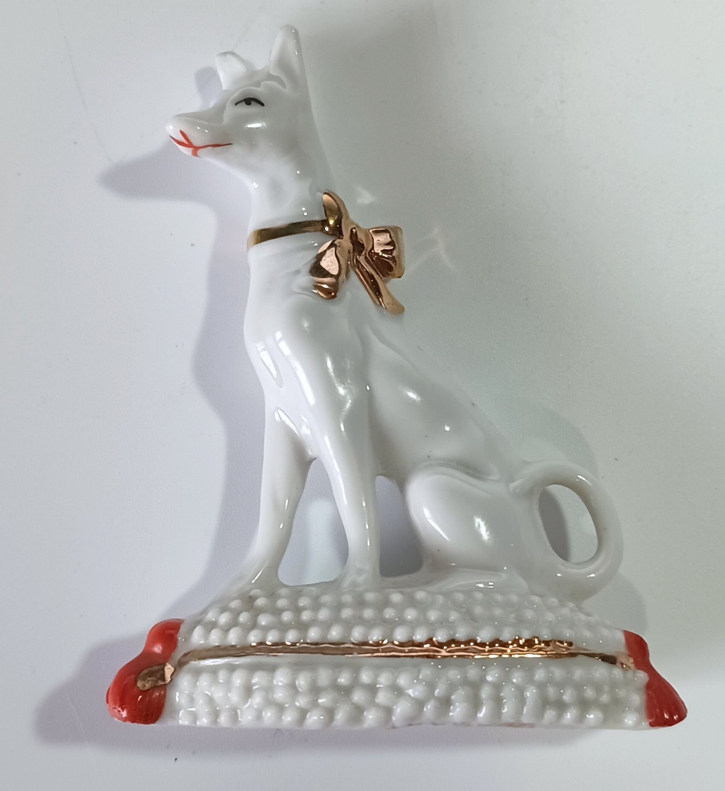 Vintage Germany Porcelain Figurine 2-7/8″: Egyptian Dog w/ Gold Bow