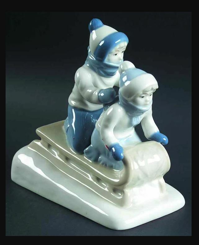 1992 Vintage Paul Sebastian Porcelain Figurine Boy & Girl on Sled Sledding 6″