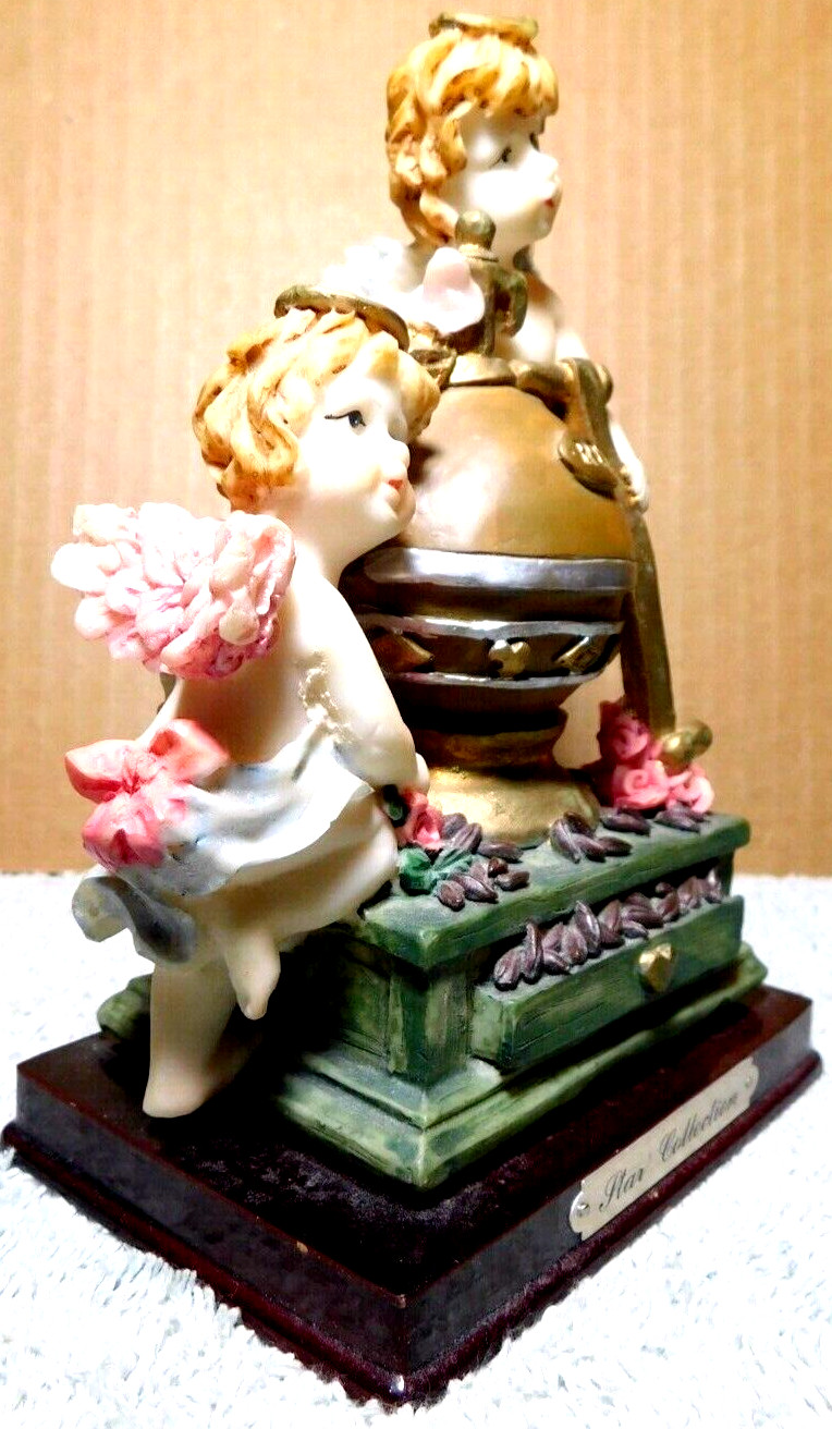 Star Collection~Two Cherubs Statues On A “RTB” Globe Ball Vintage