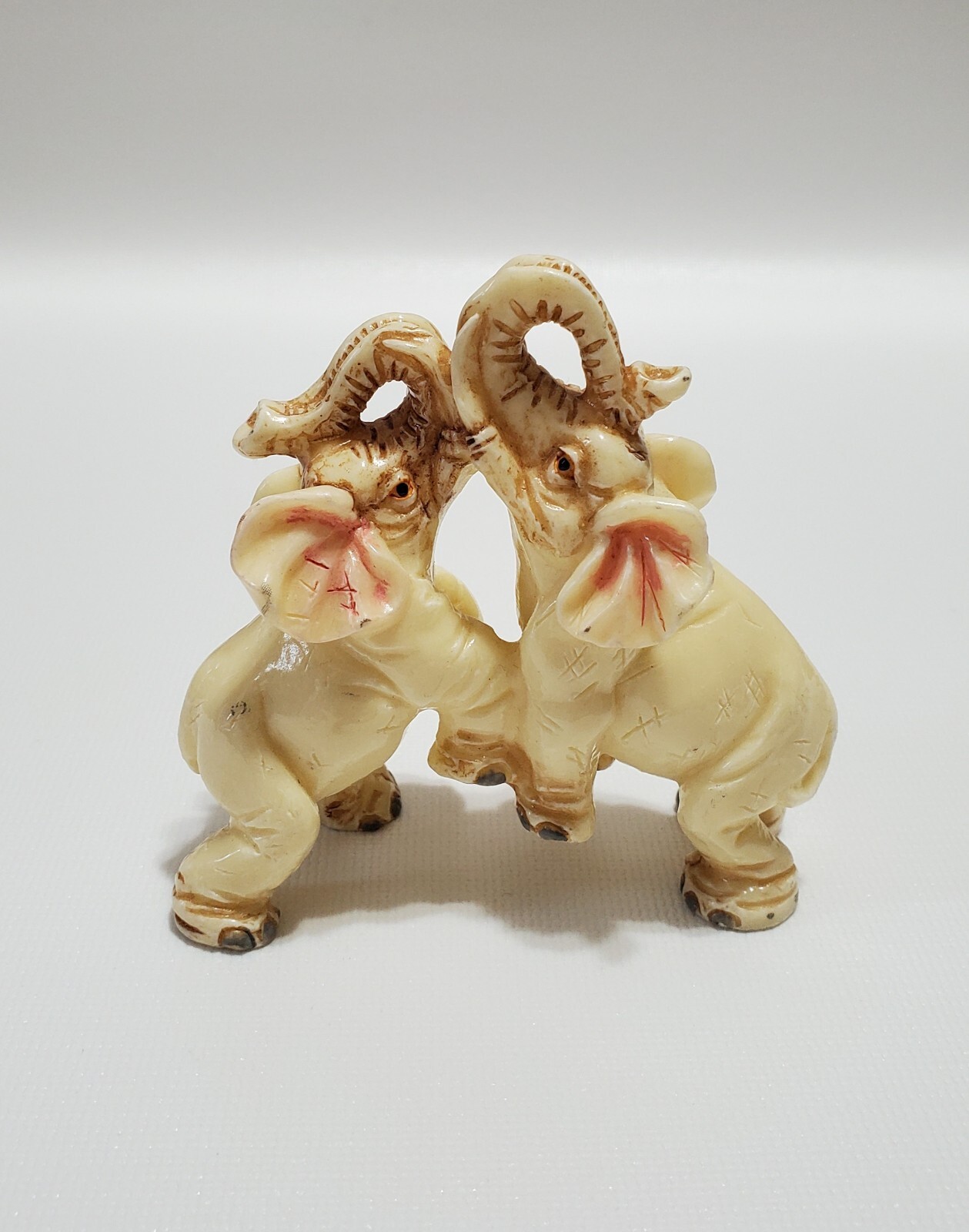 Carved White Resin Fighting, Playing Elephants Figurine, Hand-Painted