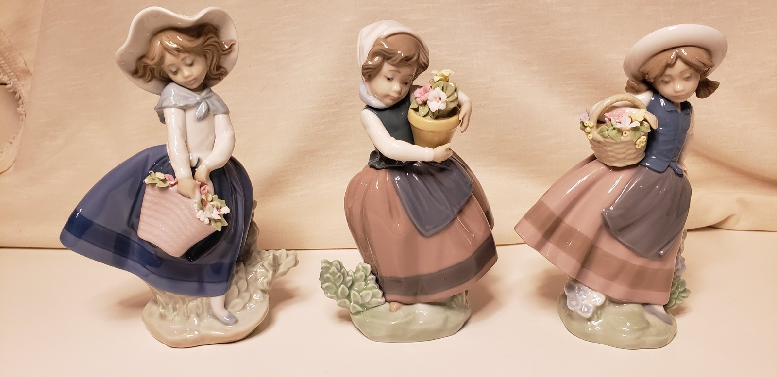 Lladro Figurines. Girls with Flowers. 3 in all. Ref.#’s 5221,5222,5223. 3-Boxes