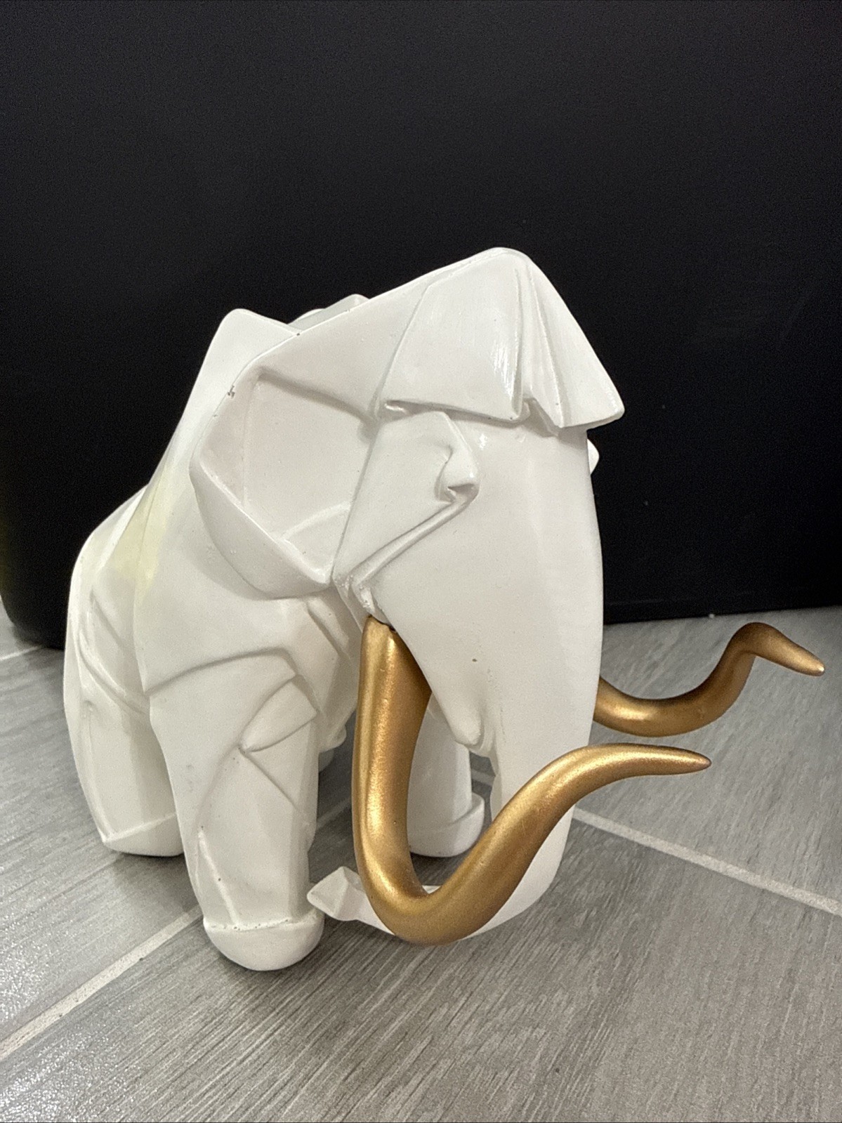 White Origami Mammoth Figurine with Gold Tusks – Geometric Elephant Statue Decor