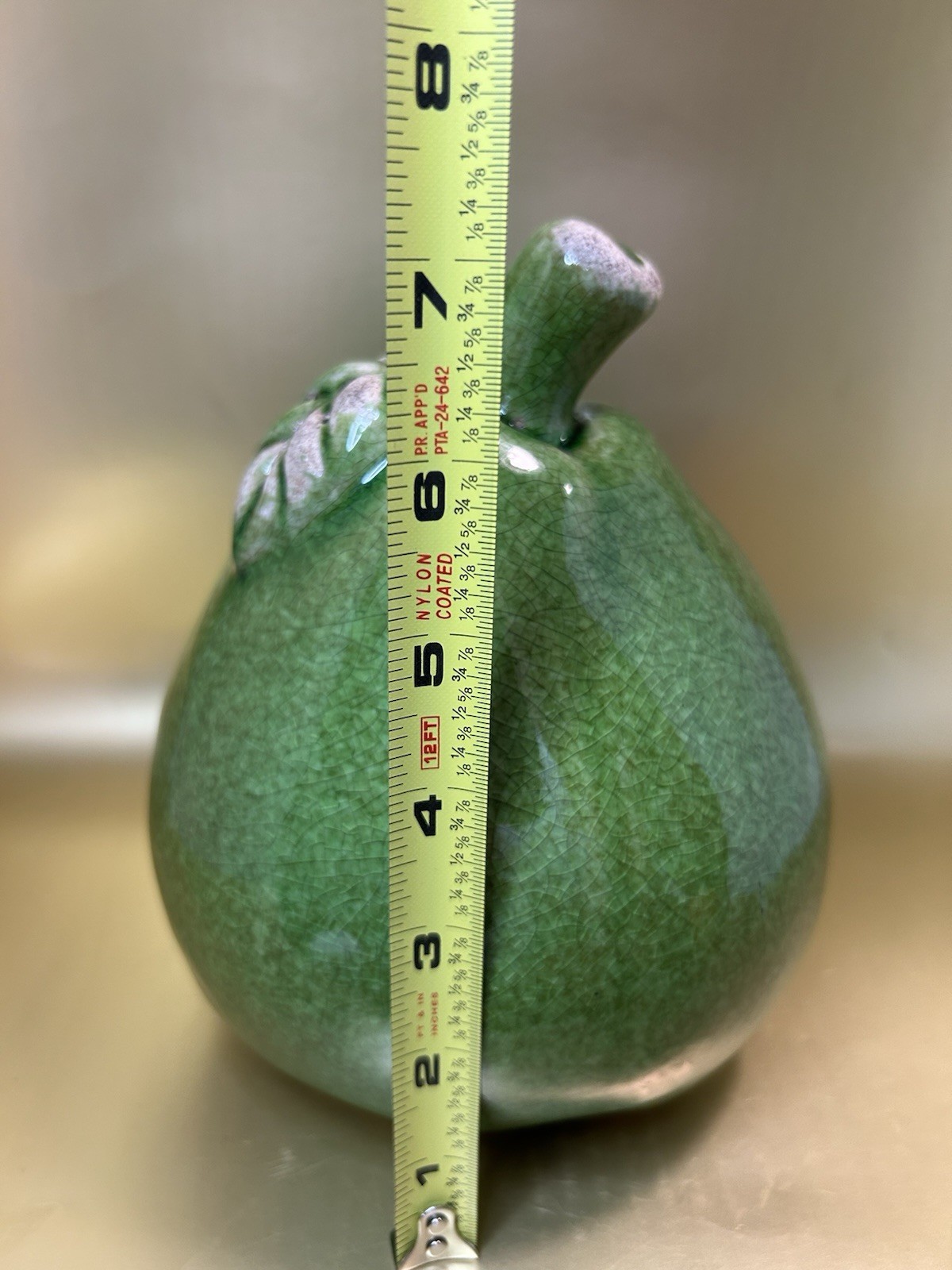 Vintage Mid-Century Modern (MCM) crackle-glazed green ceramic pear figurine.