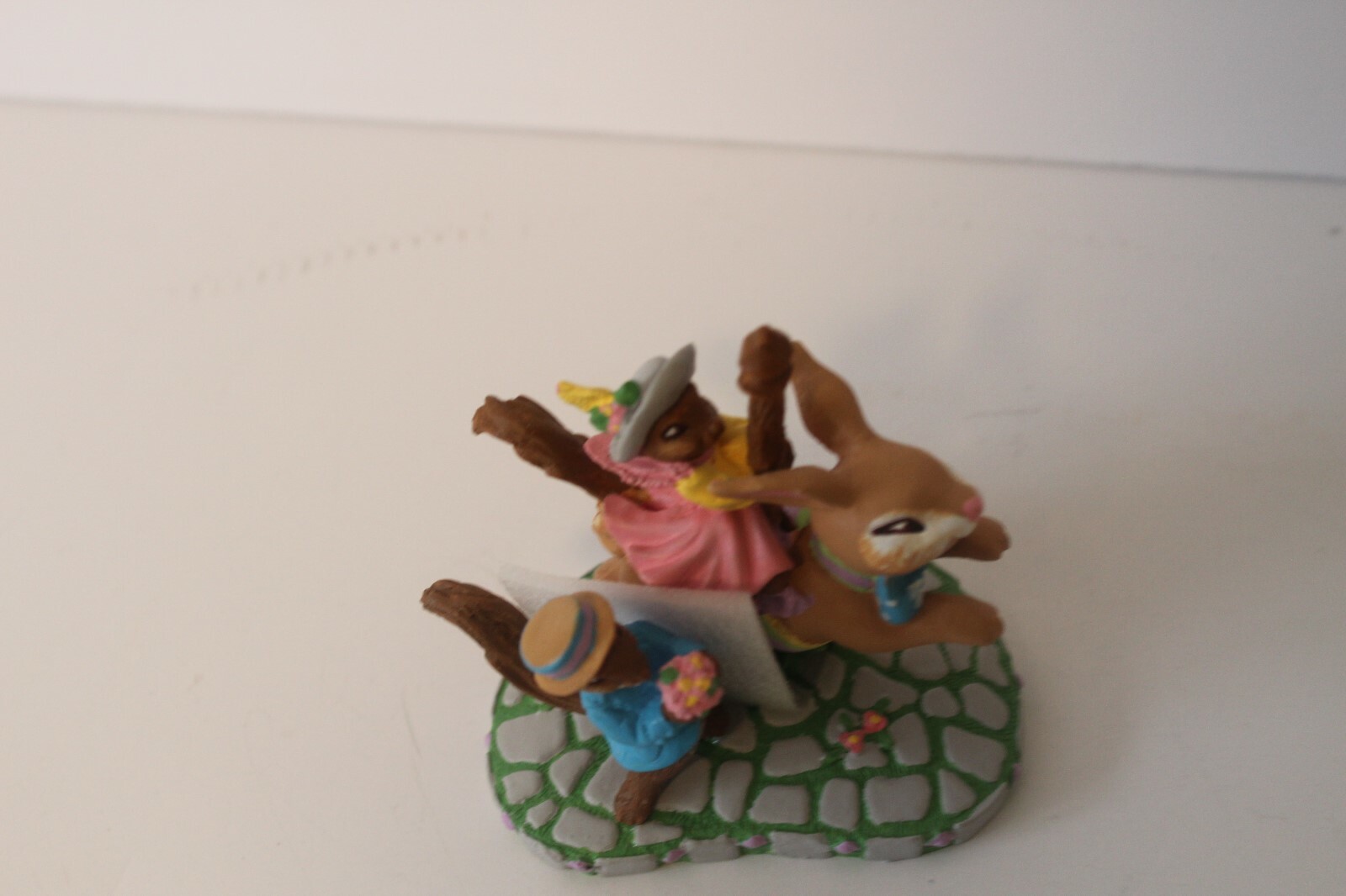 CAROUSEL SQUIRRELS on RABBIT BY KATHY JEFFERS 1993 AVON FIGURINE