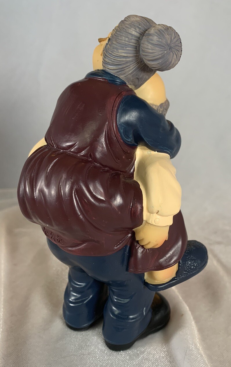 Grandparents Figurine, Grandpa Giving Grandma A Piggy Back Ride!