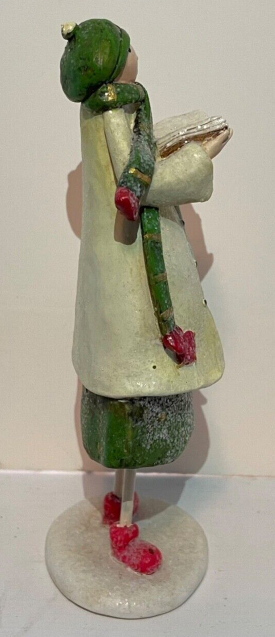 Caroler Figurine White Coat Green Scarf and Hat Red Shoes Song Book