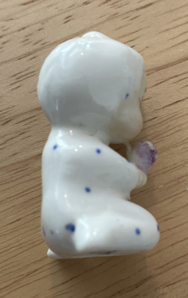 Vintage Miniature Baby Bone ChinaFigurine Hold Flowers Symbol N 1-3/4 inch Tall
