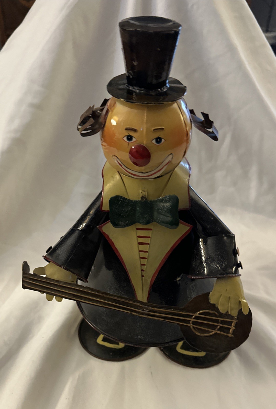 1950’s hand-painted rustic metal clown sculpture. On Vintage Spring So He Moves