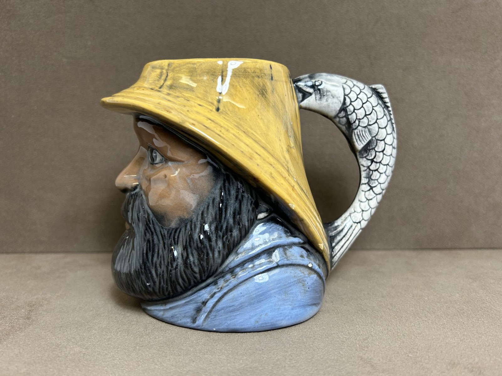 CERAMIC FISHERMAN WEARING A YELLOW HAT TOBY MUG 5″