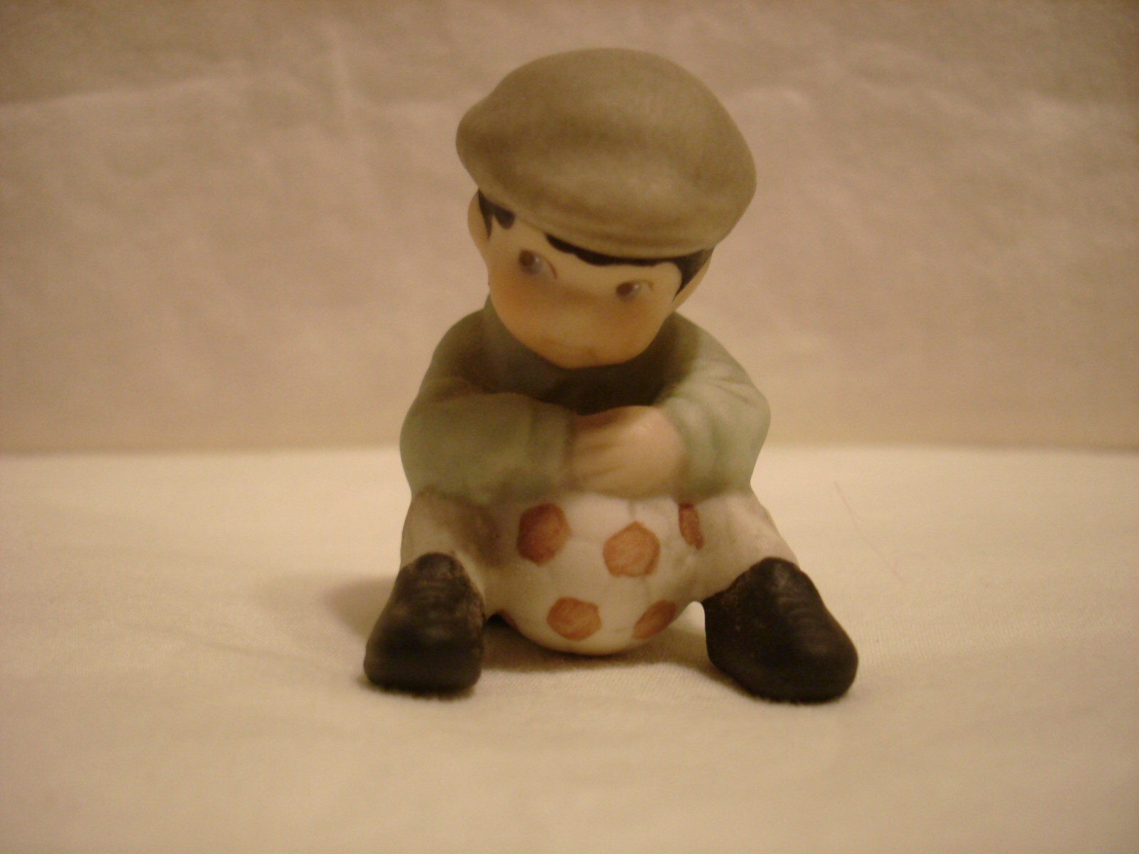 Enesco Young Boy Child KEEP YOUR EYES ON THE GOAL 1999 Porcelain Figure #626929