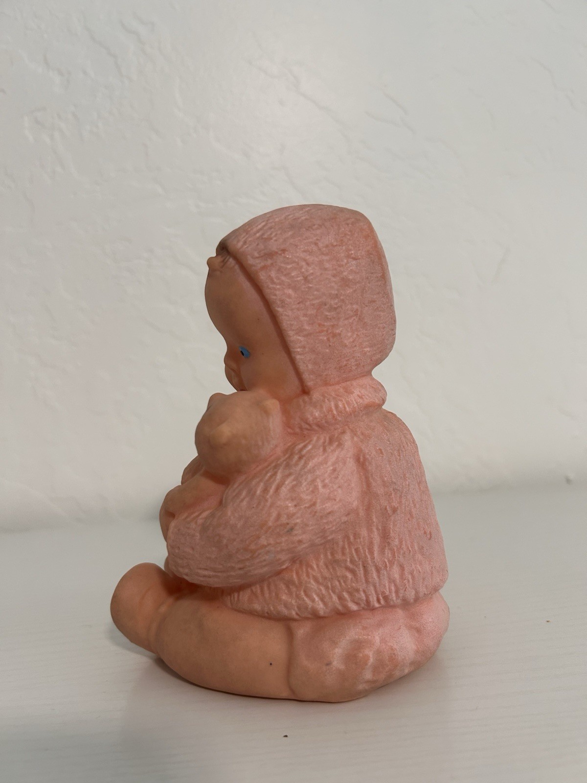 Mid 20th century model molded rubber baby figurine with teddy bear 6” height