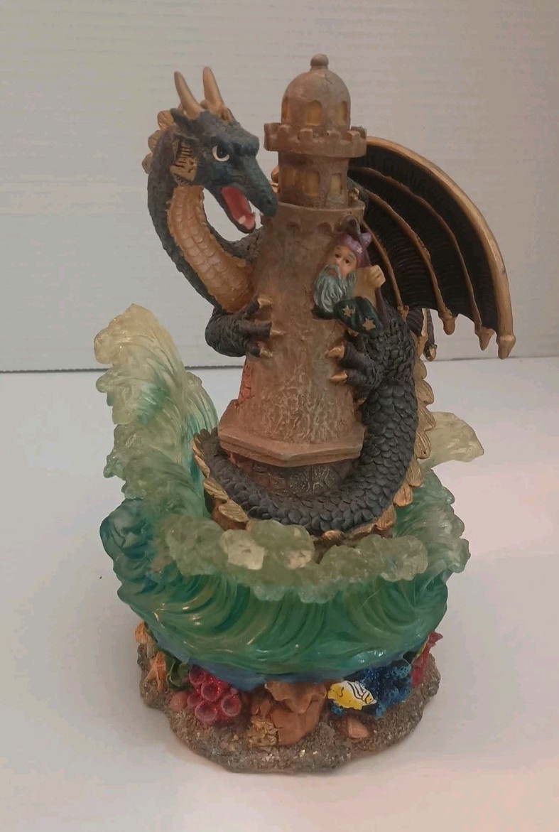 Merlin Fights The Dragon Lighthouse Figurine Seashore Ocean Water 8.5 In Tall