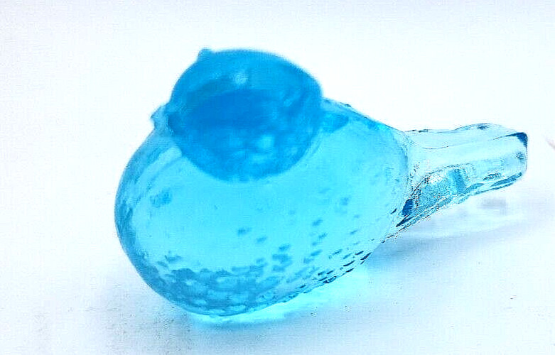 Wilkerson Blue Spackler Bird Figurine Glows Orange Black Light Shine