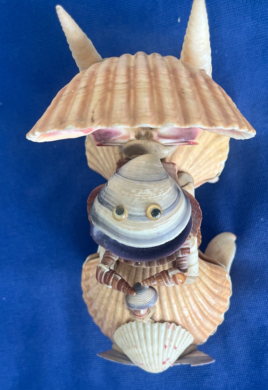 Vintage Handcrafted Figurine Riding a Vehicle made out of Seashells