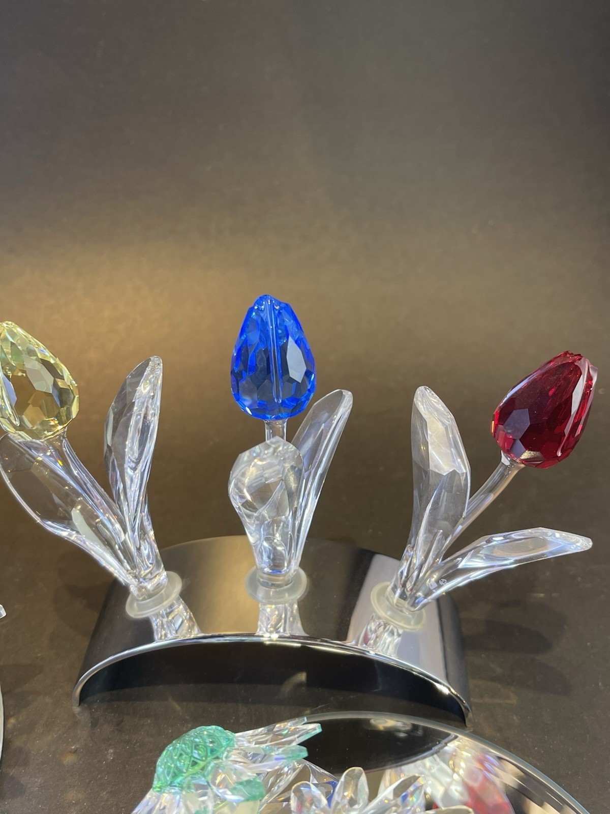 swarovski , maxi flower,lg&small tulip in stands&3 col daisies in stand,