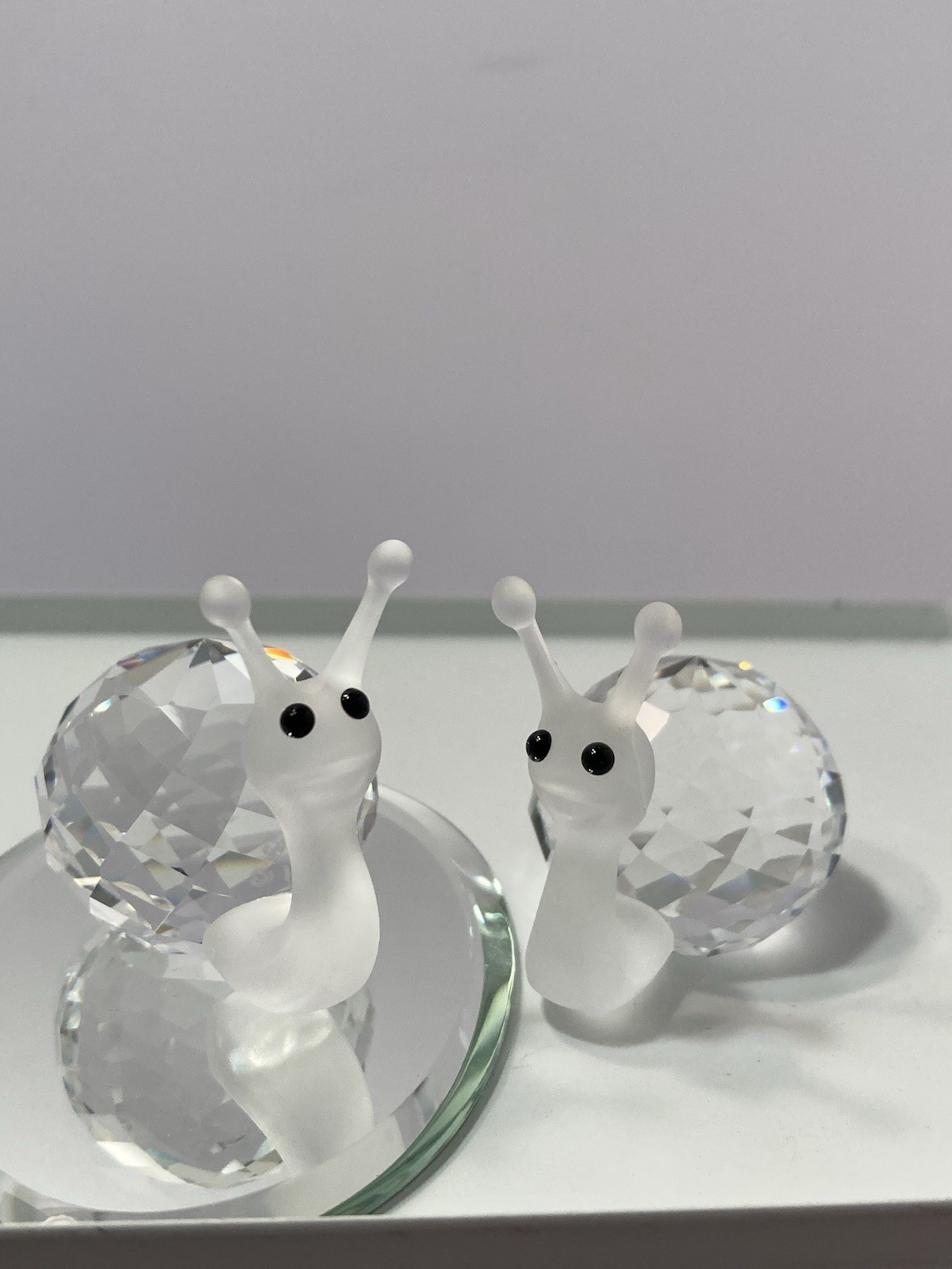 swarovski crystal small snail figurines (2)