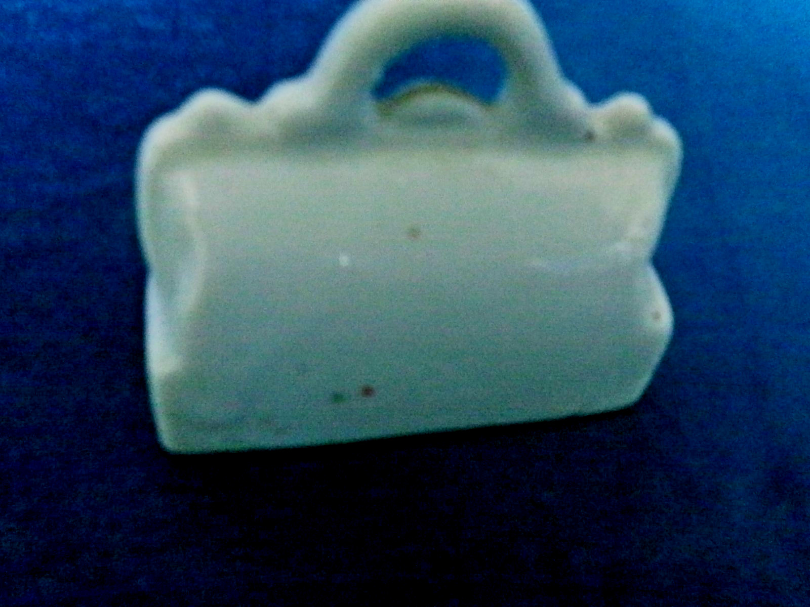 LOT OF 3 “MADE IN OCCUPIED JAPAN” ITEMS INCLUDING TEACUP, FIGURINE, AND PURSE