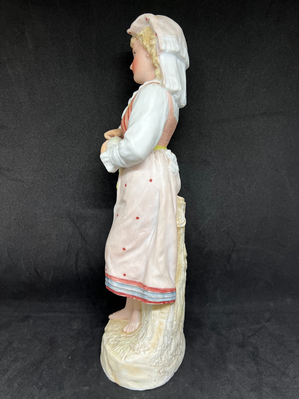 Gebruder Heubach-German Bisque-A Young Barefoot Woman Holding An Apple 12 1/2″