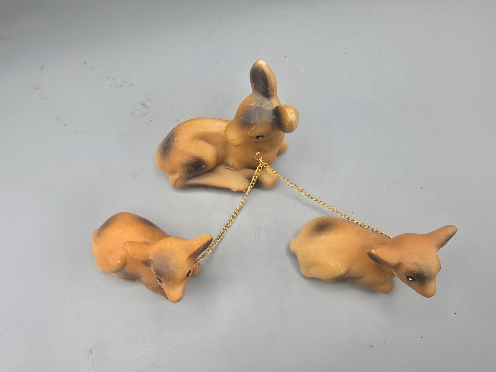 Vintage 1950s Porcelain Chained Dog, Cat, and Deer Family Figurine Sets