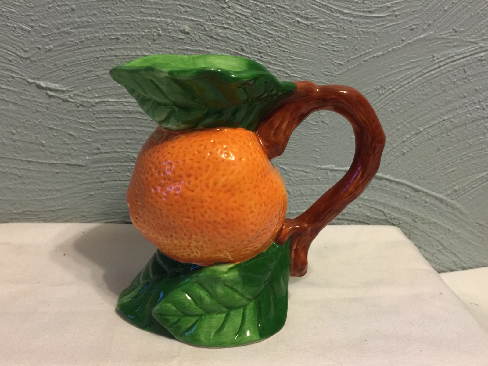 Orange Pitcher, Jay Wilfred Andrea by Sadek, 5 & 1/2 inches tall