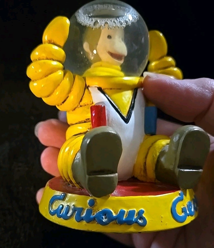 Curious George Astronaut Snowglobe