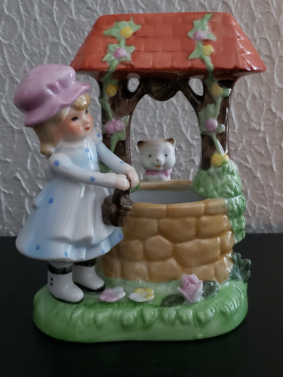 Vintage girl with cat at wishing well hand painted figurine made in Korea