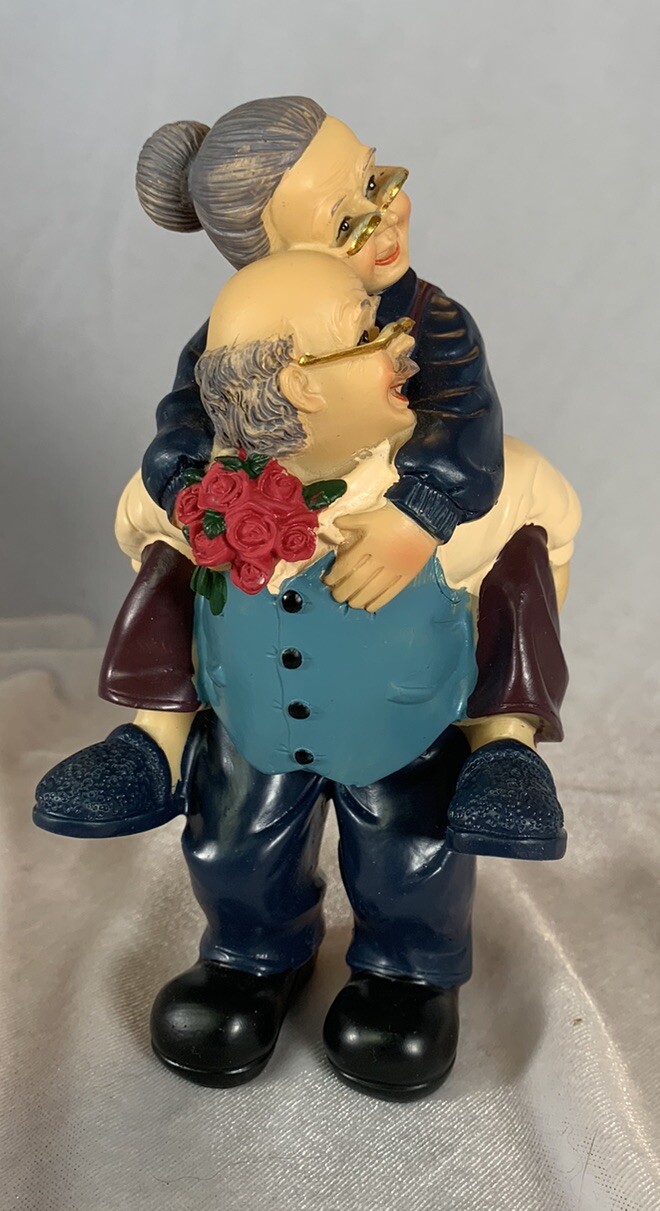 Grandparents Figurine, Grandpa Giving Grandma A Piggy Back Ride!