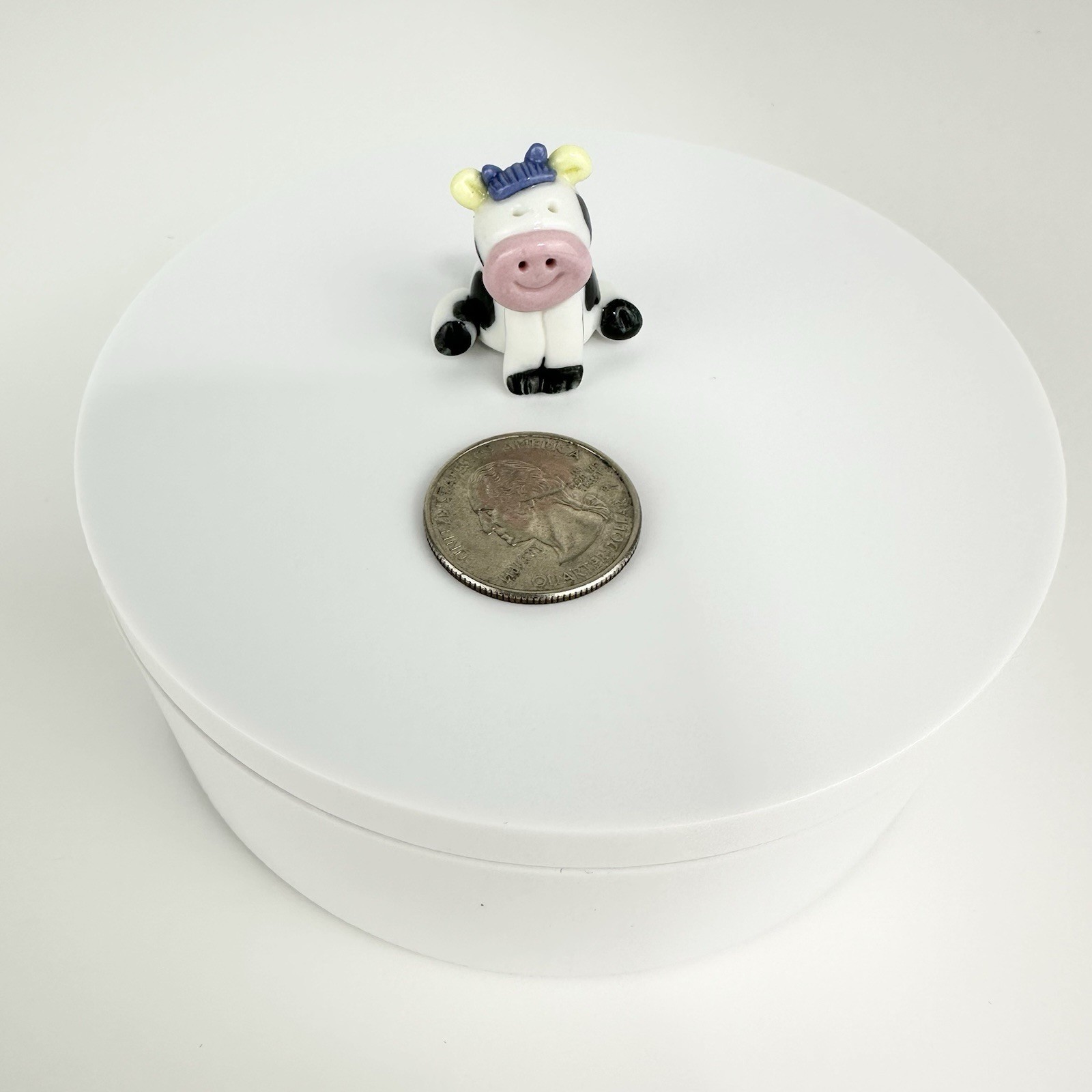 Vintage Mini Black And White Cow Figurine Sitting
