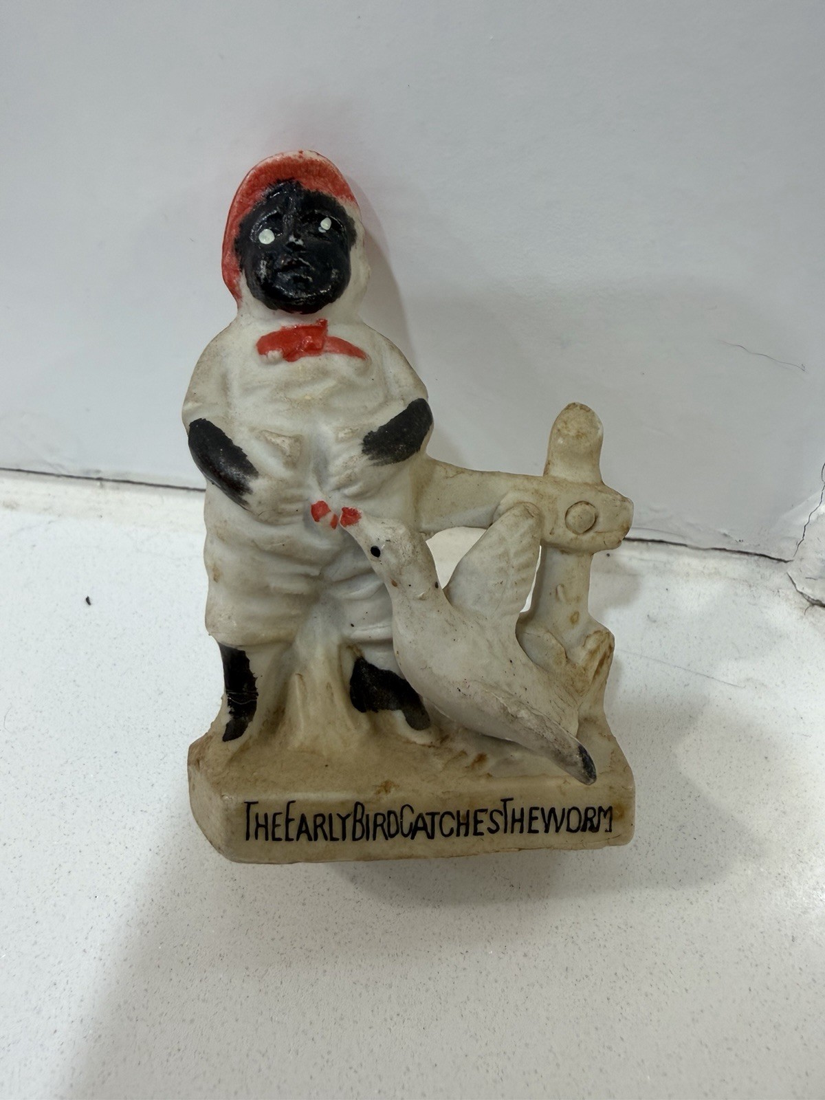 Vintage 1900-1919 Ceramic Black Figurine “The Early Bird Catches the Worm”