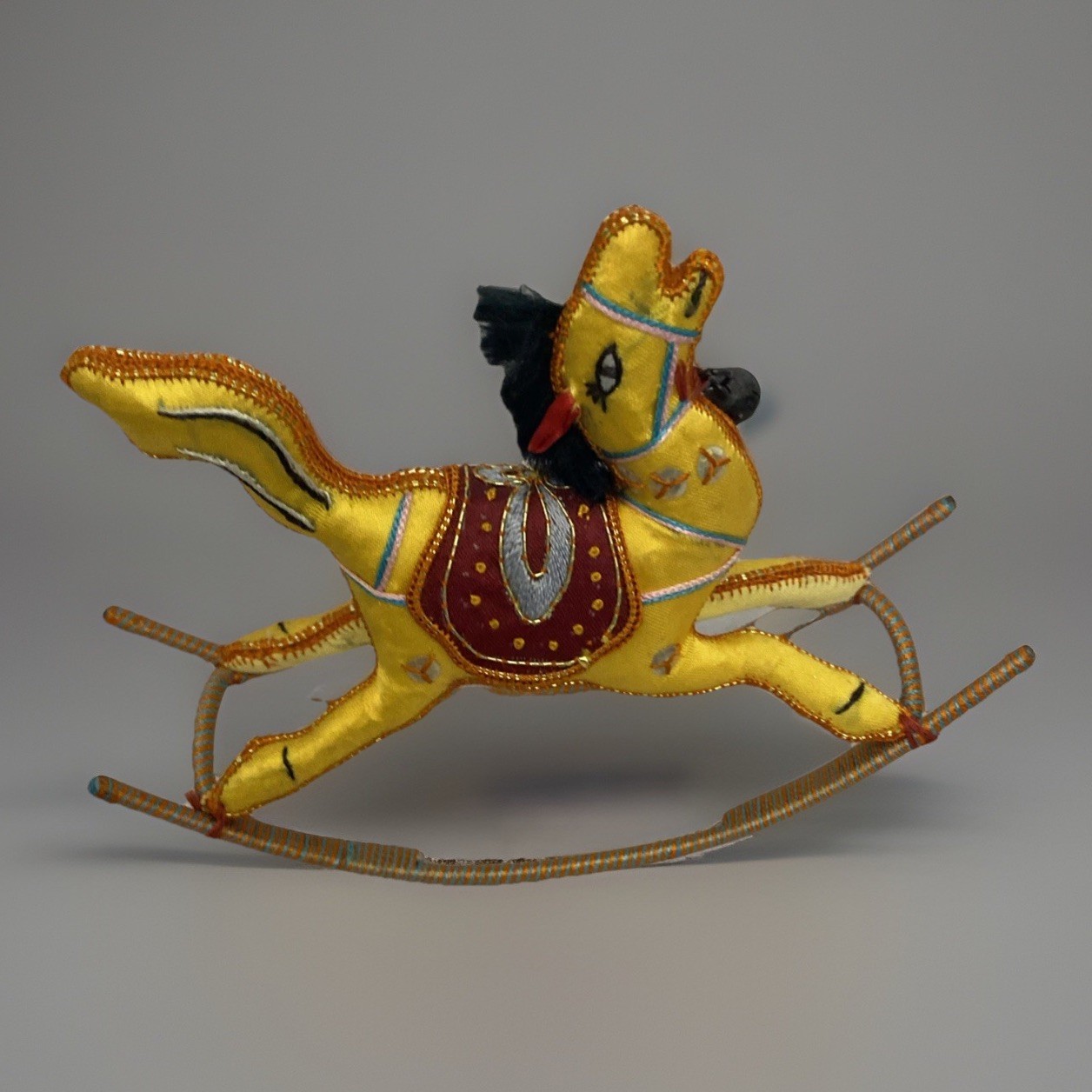 Fabric and Wire Yellow India Rocking Horse Figurine 4.5X5″