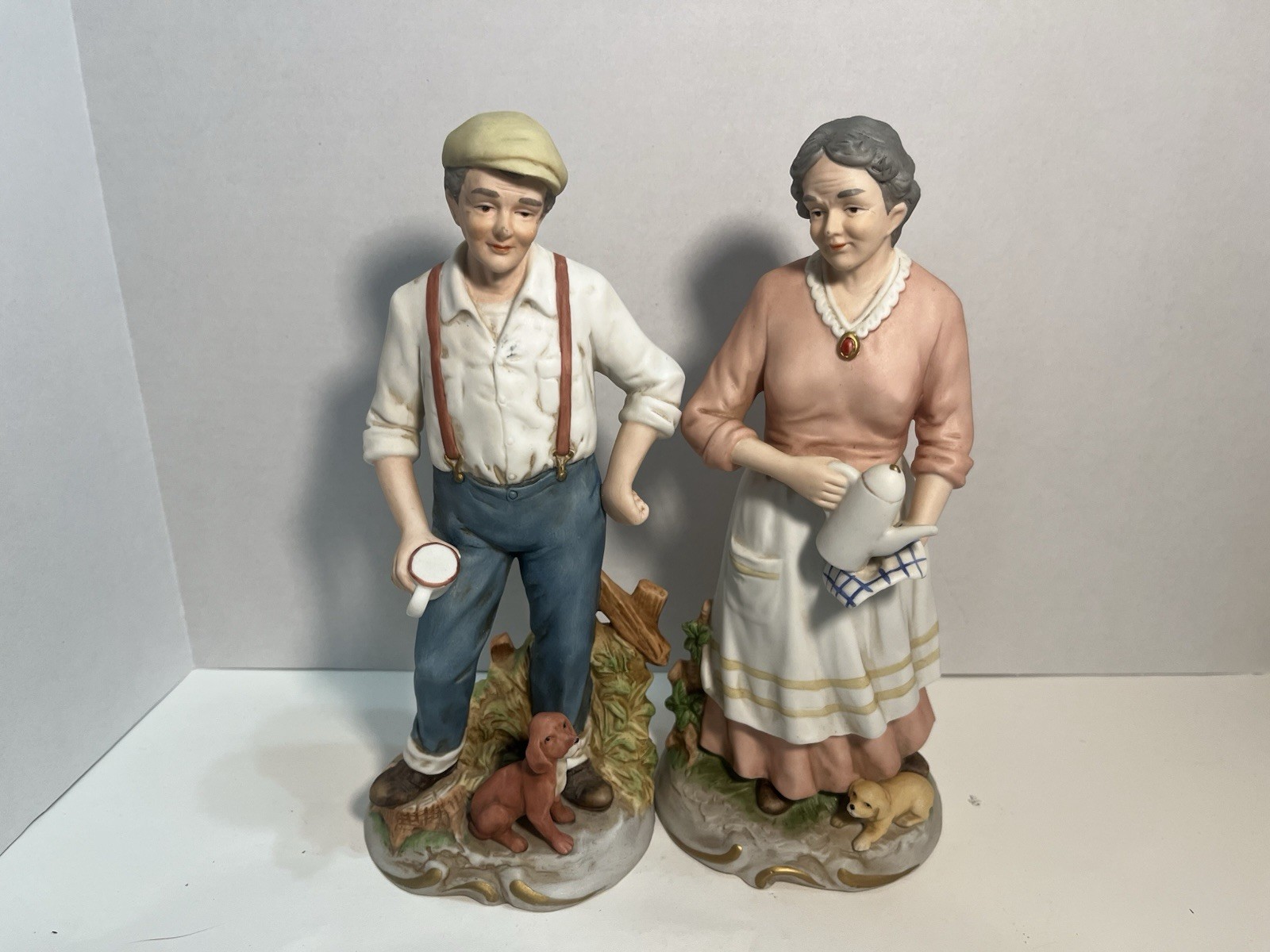 Homco #1425 Man & Woman with their Dogs Figurines 10″ Tall Porcelain 972