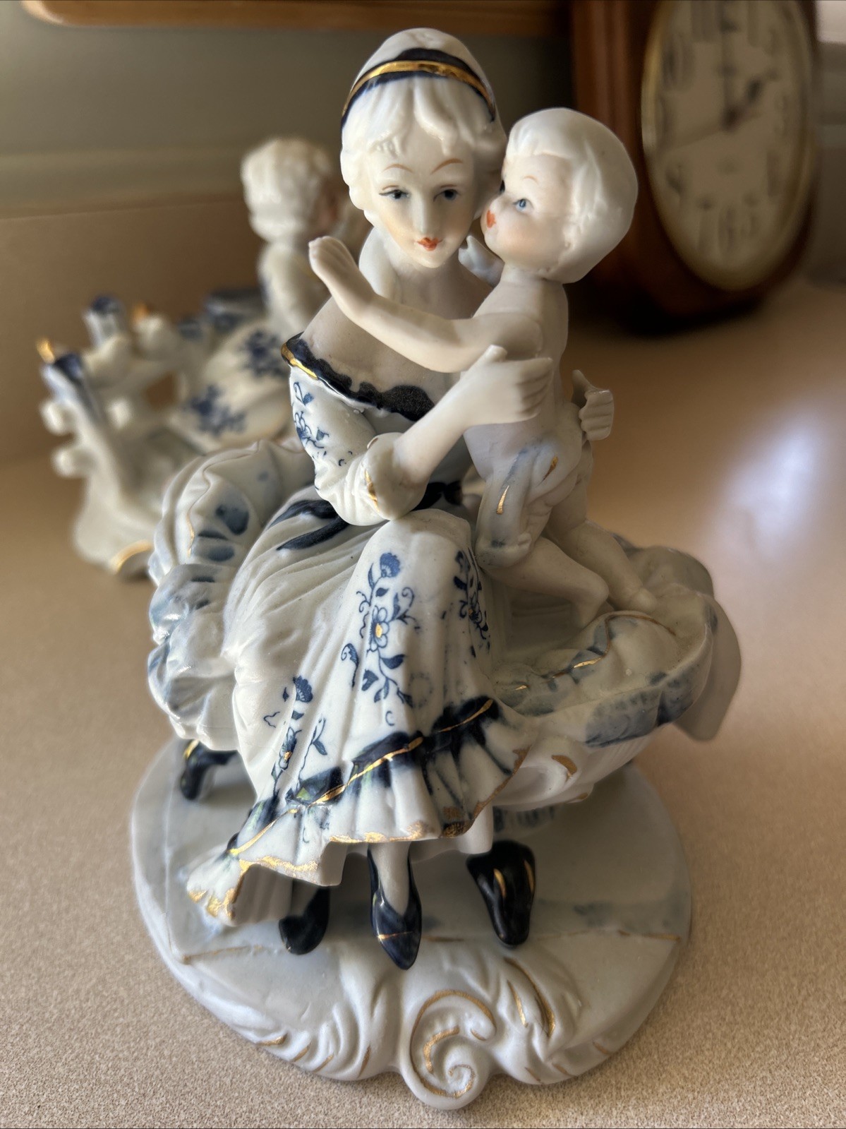 vintage hand-painted porcelain “Maternité” (Mother and Child) figurine.