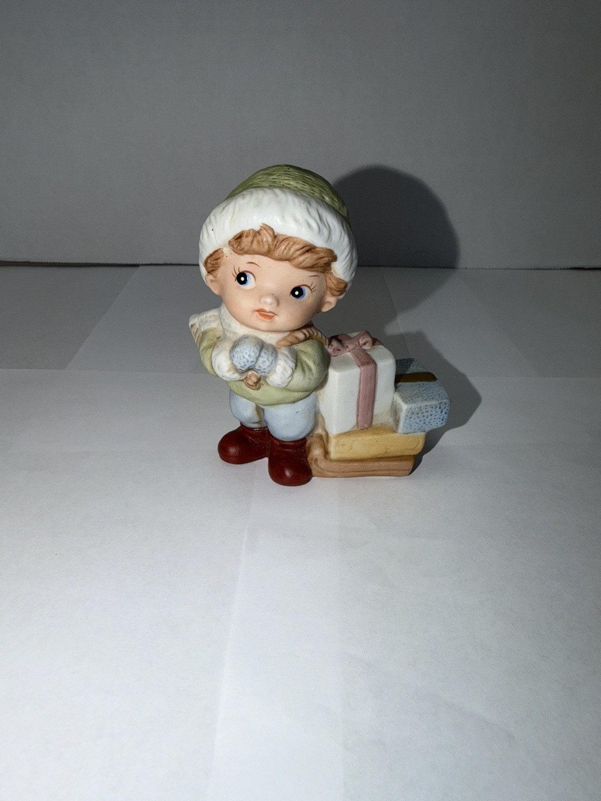 Vintage Porcelain HOMCO Christmas Boy with Sled & Presents Figurine #5556