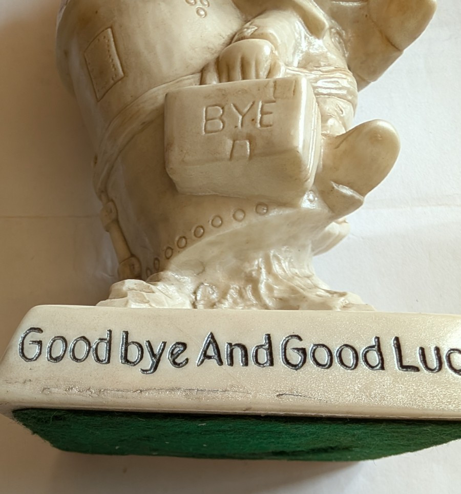 1970 W. & R. Berries Co. Goodbye and Good Luck statue office worker on rocket