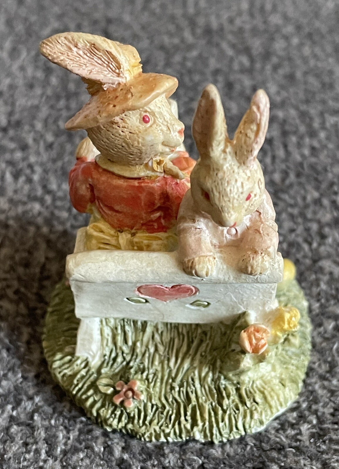 Female Rabbit Reading Book On Bench with Child Rabbit Figurine