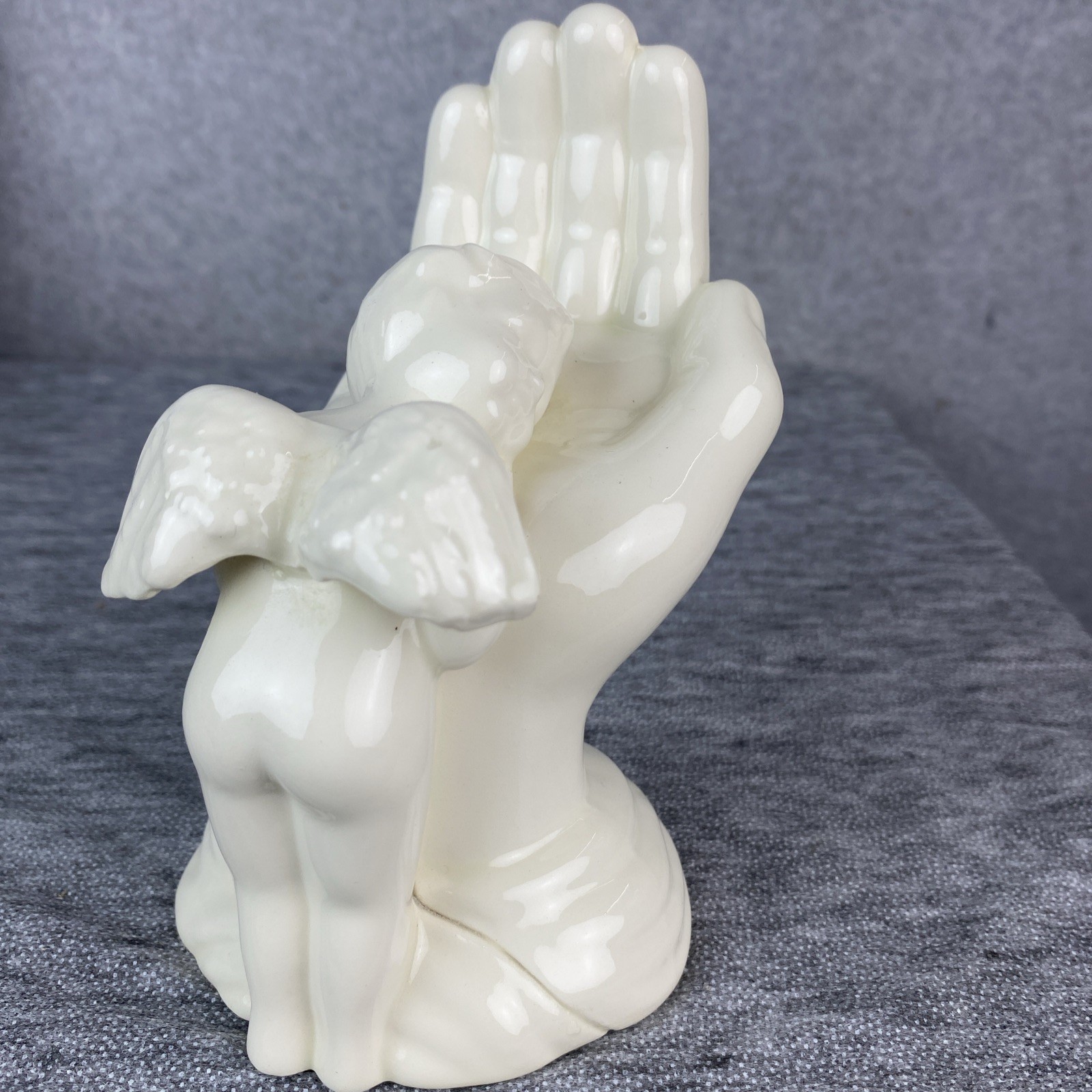 Ceramic Sleeping Cherub On The Hand of God Angel White Shiny Glaze