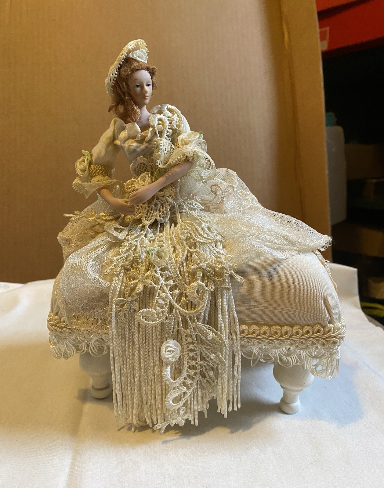 Victorian 2004 Popular Ivory Ottoman with Porcelain Tassel Doll Figurine