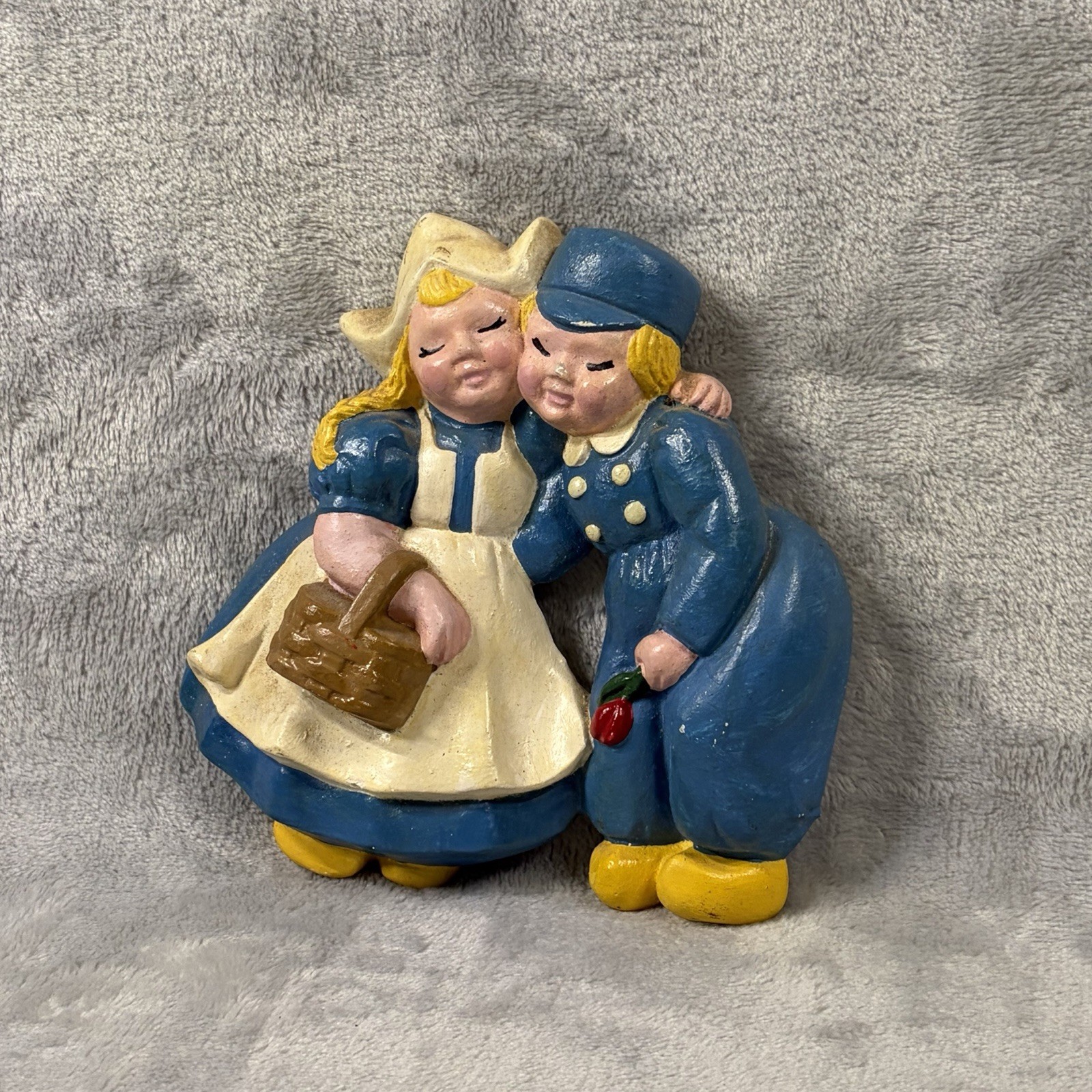 vintage hand-painted chalkware featuring a Dutch boy and girl