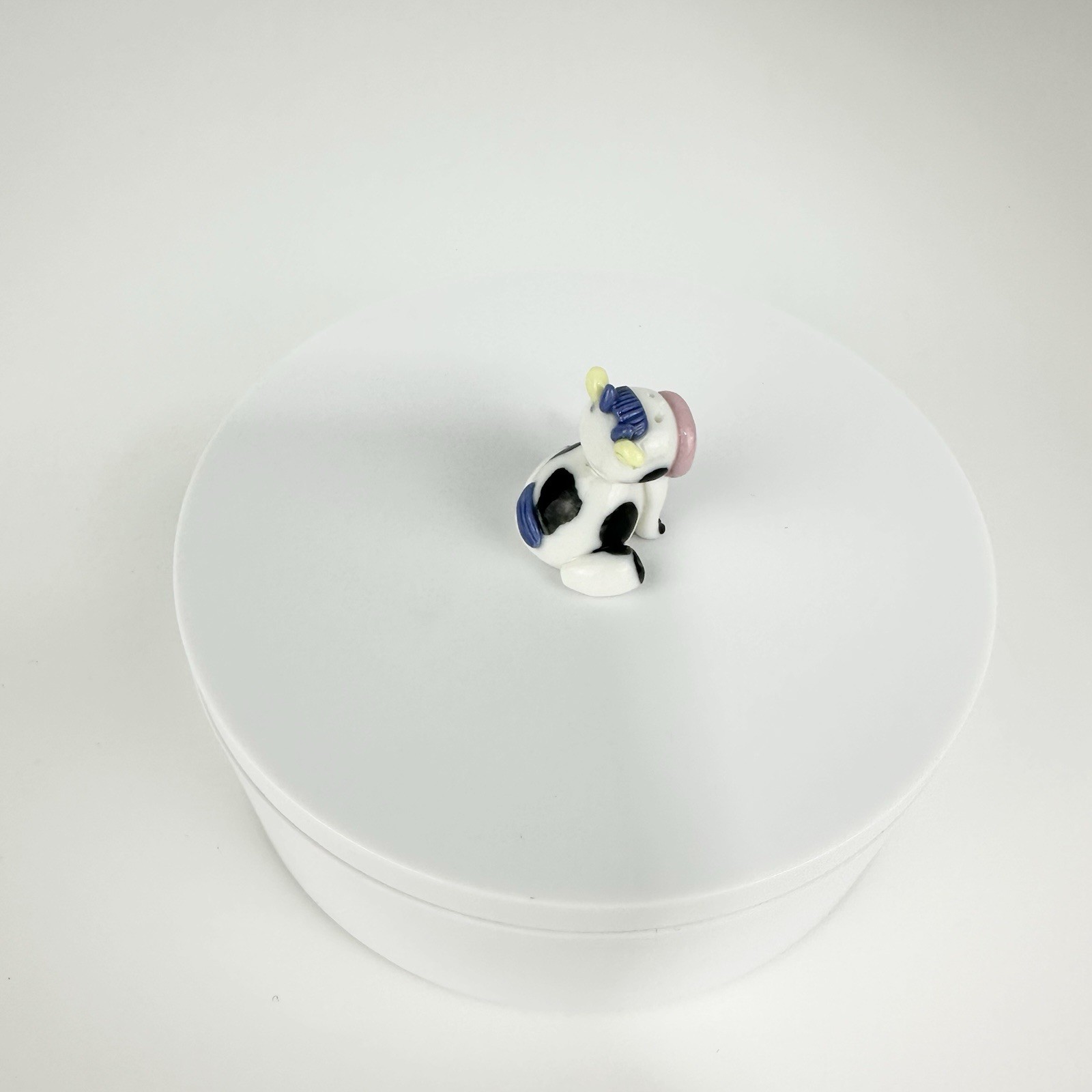 Vintage Mini Black And White Cow Figurine Sitting