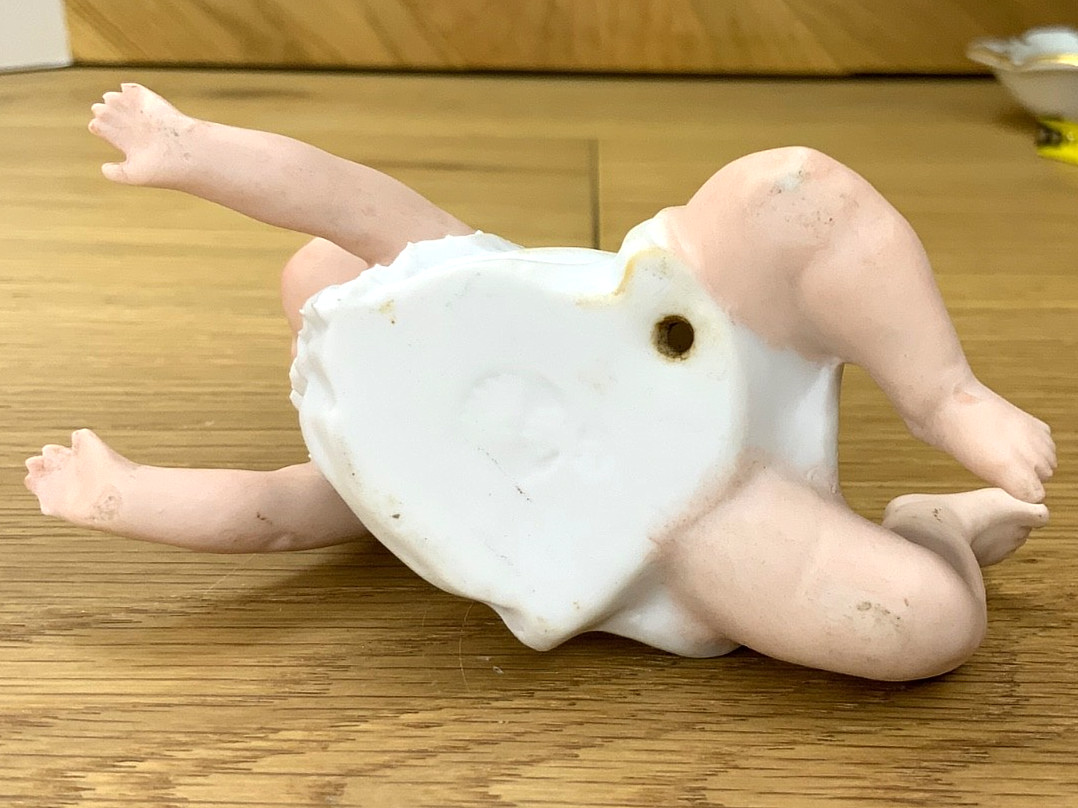 Gebruder Heubach Piano Baby Figurine Lying on Stomach German Bisque Vintage