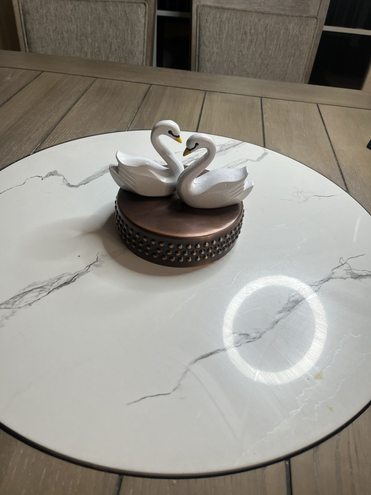 Two White Swans Figurine making Heart shape sitting on a bronze Copper base