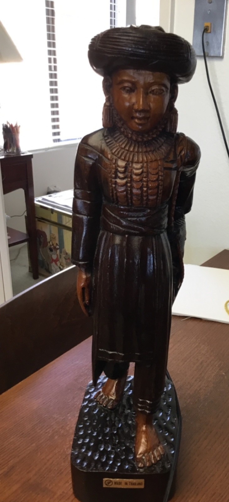 wood carved staute of woman from thailand. in great condition