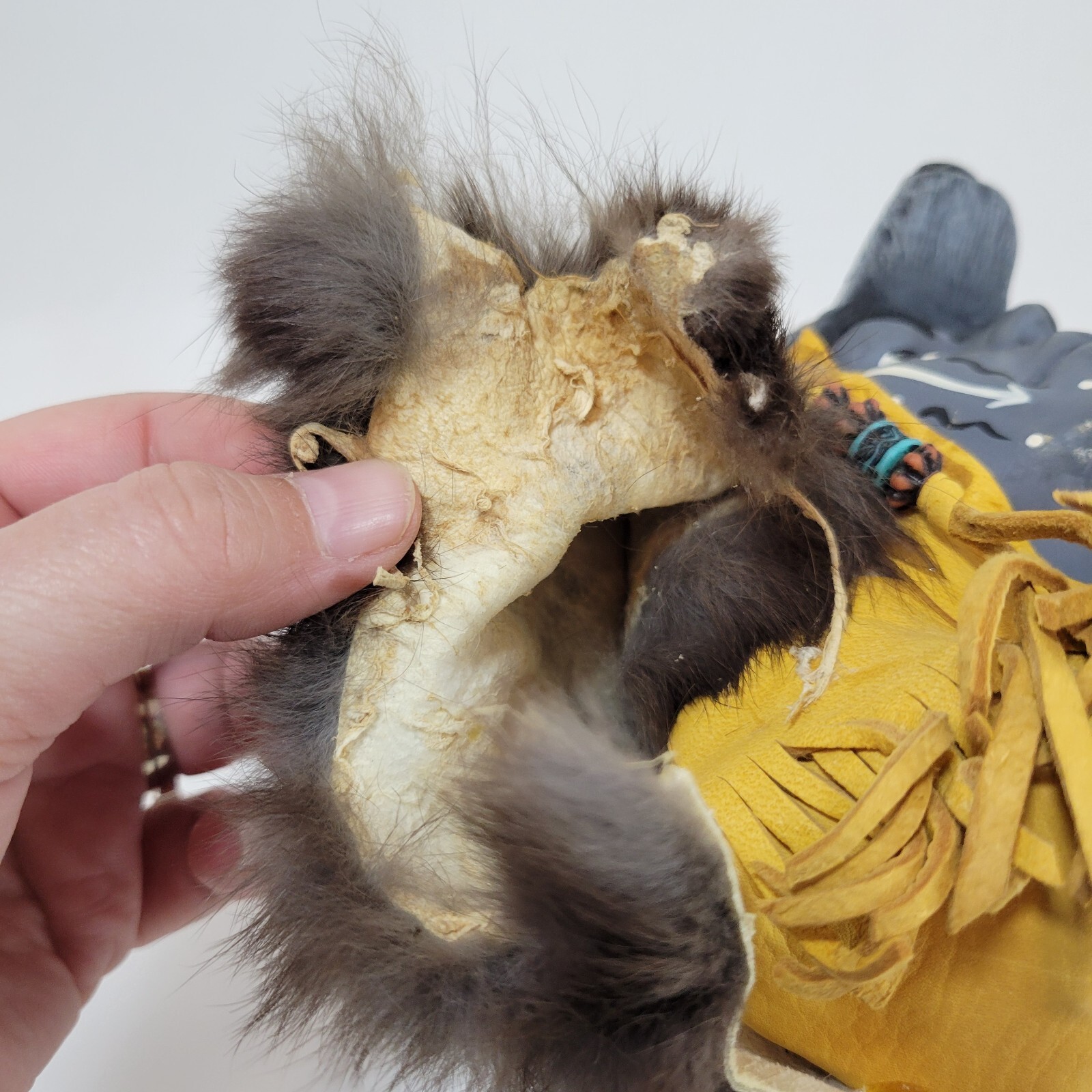 Indigenous tribal bust wolf headdress ceramic fur lining statue leather tassles