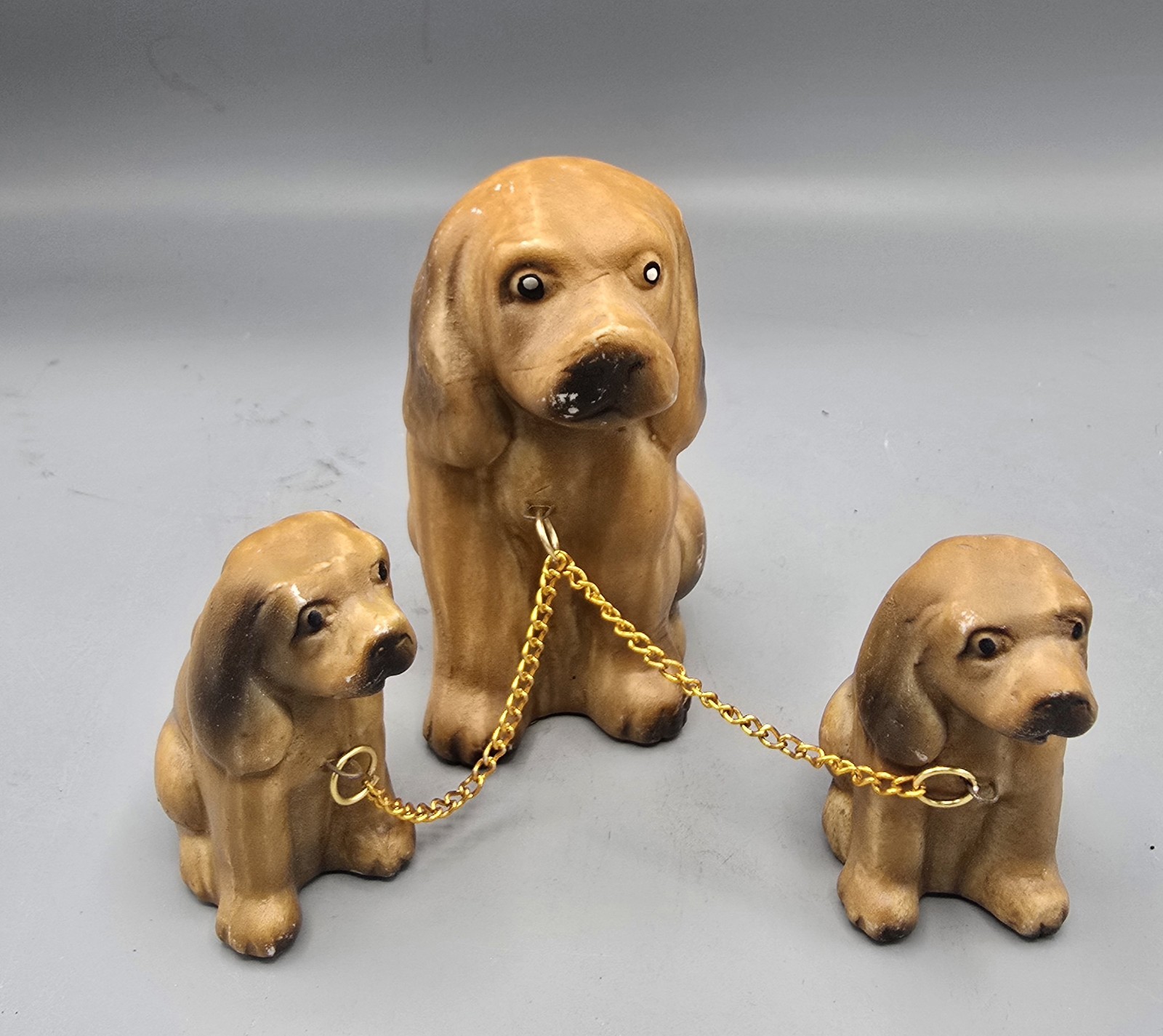 Vintage 1950s Porcelain Chained Dog, Cat, and Deer Family Figurine Sets